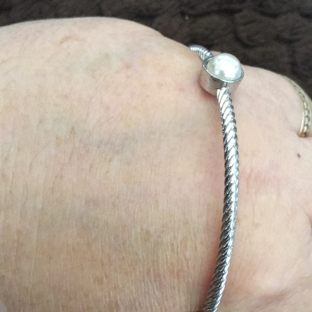 Thin silver tone bangle bracelet